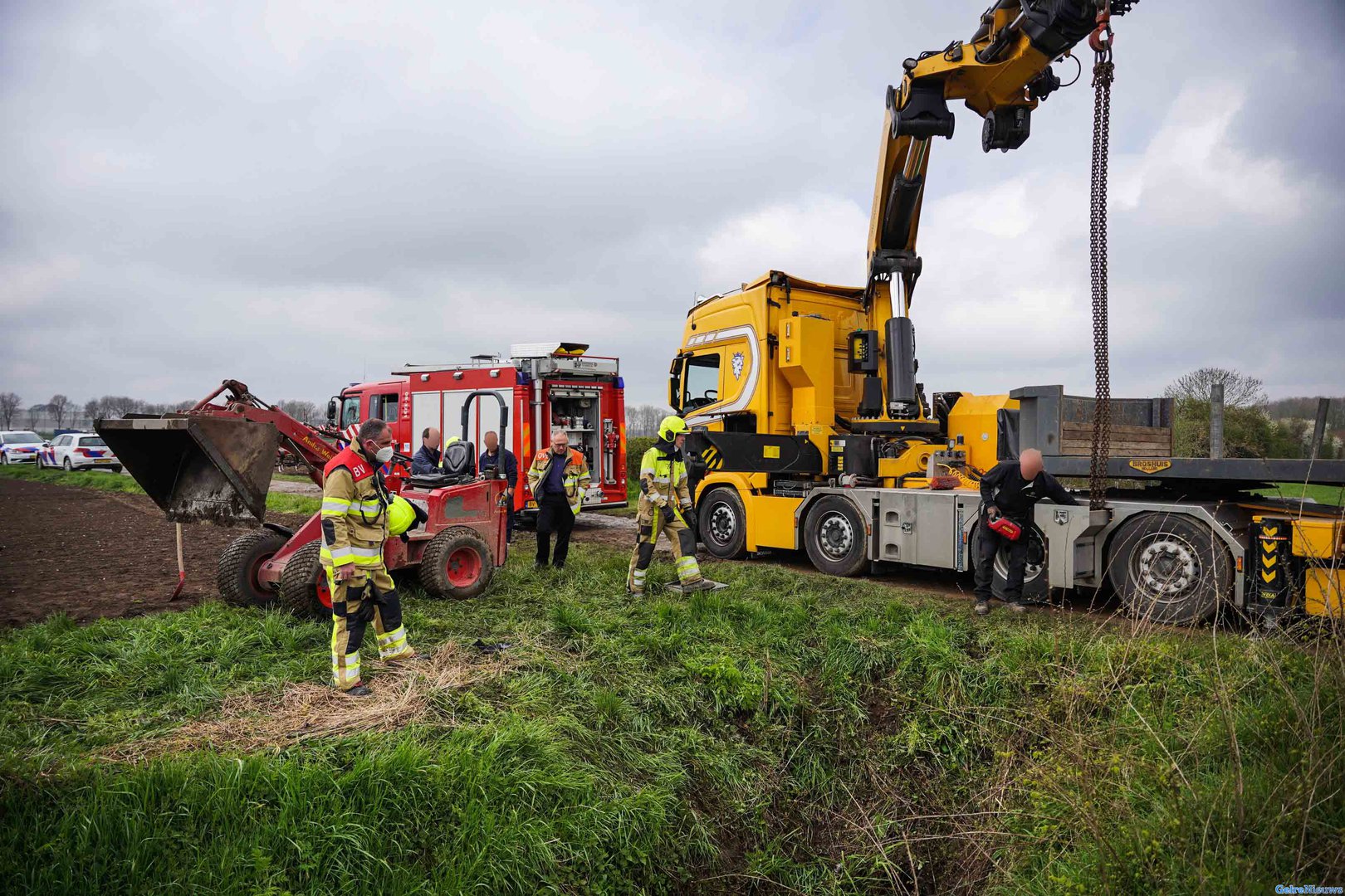 Man komt met voet onder shovel terecht in Nederasselt