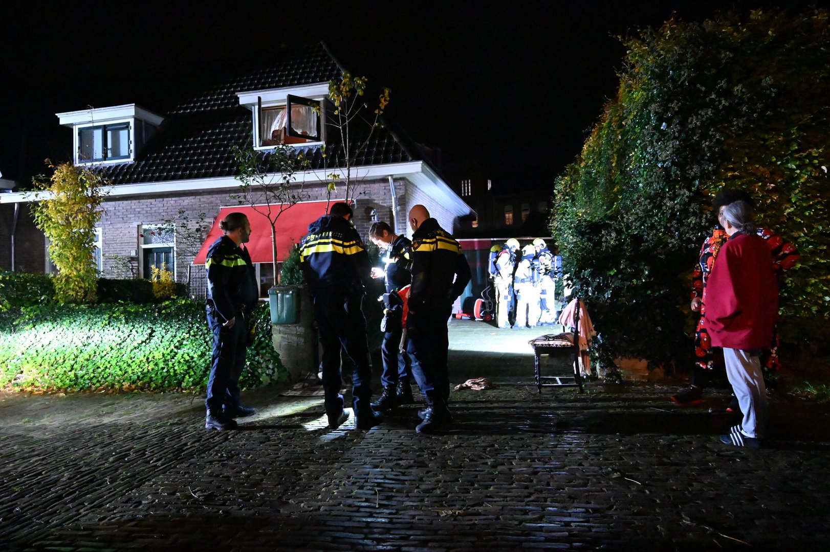 Wasmachine vliegt in brand in woning