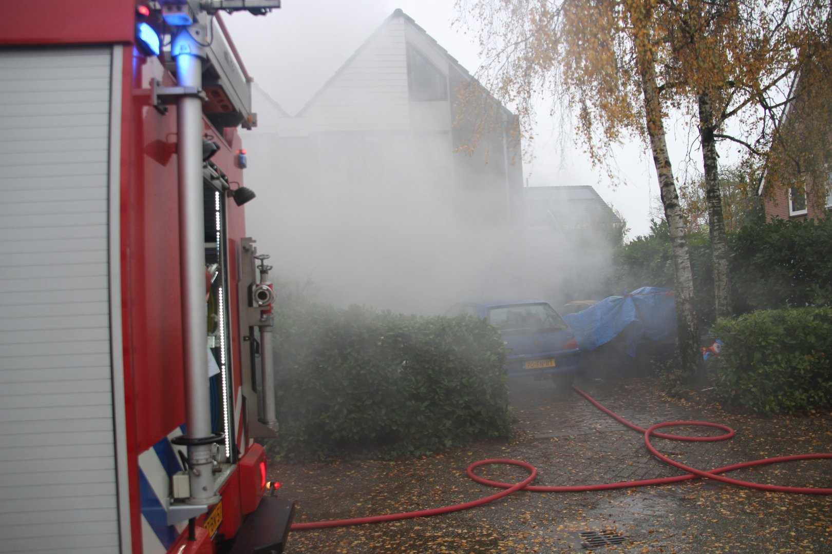 Buurman redt kat uit brandende woning